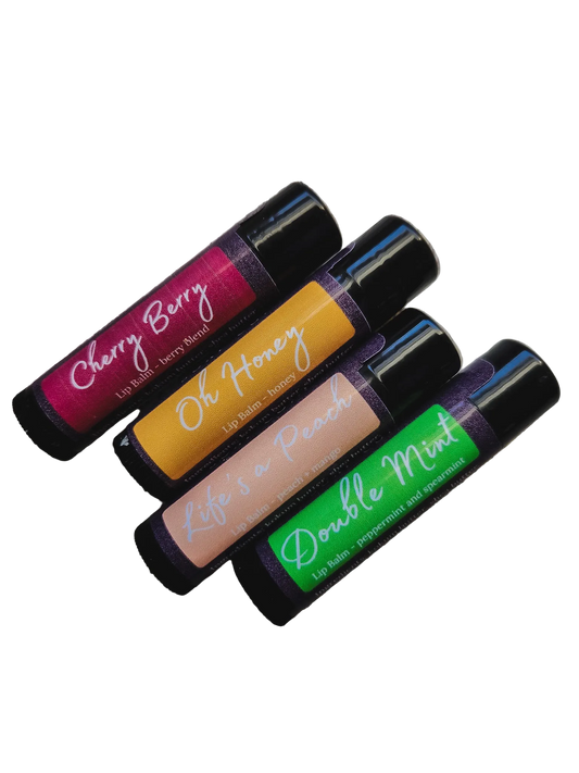 Four lip balm tubes with different flavors on a white background