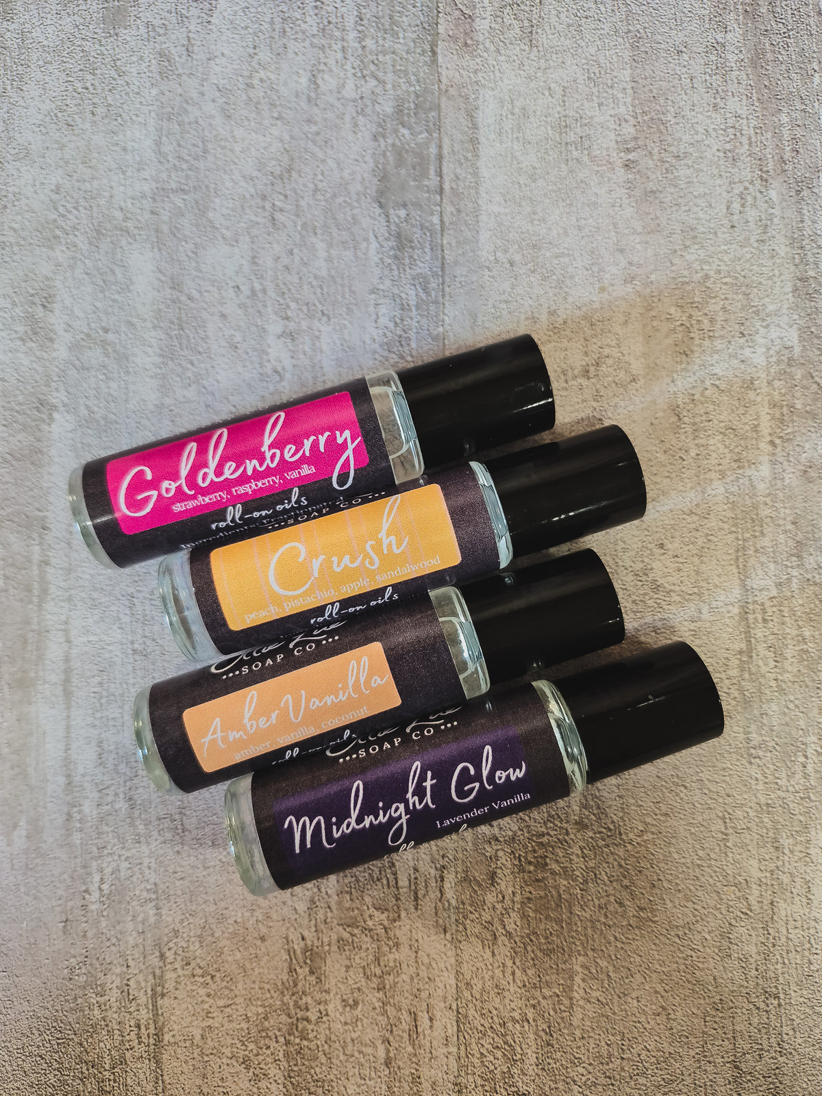 4 rollers lined up on a gray background