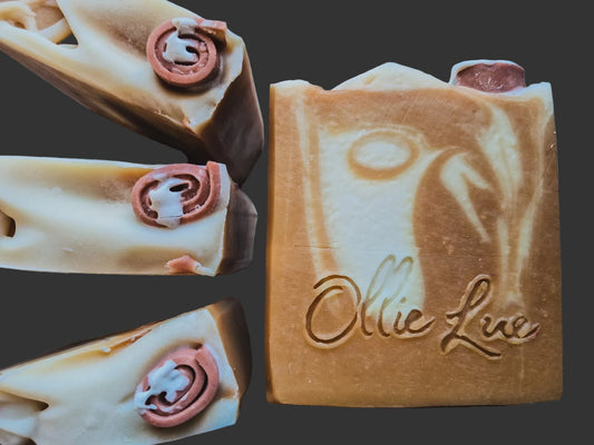 Soap bar with 'Ollie Lue' branding on a dark background