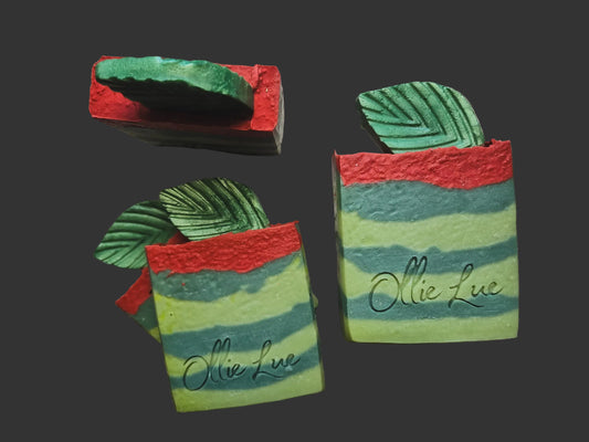 green and red striped soap with a leaf on top stamped ollie lue