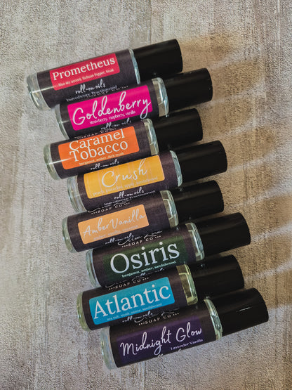 scented oil rollers lined up on a gray background