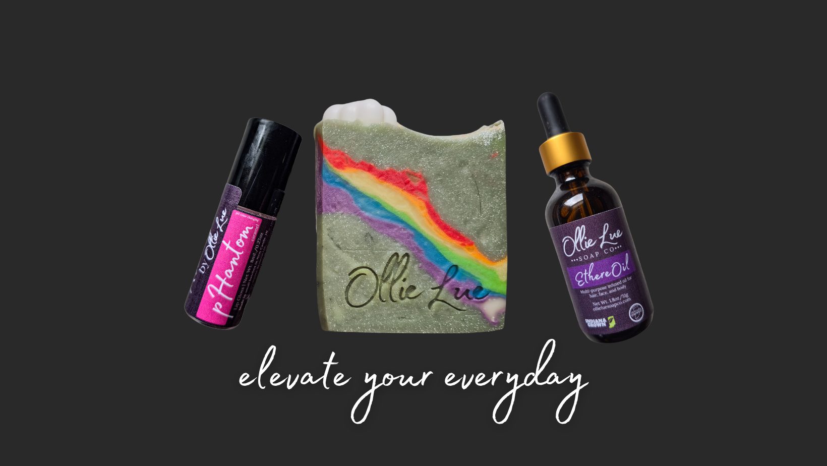 Ollie Lue products including a soap bar with rainbow design, roller bottle, and dropper bottle on a black background.
