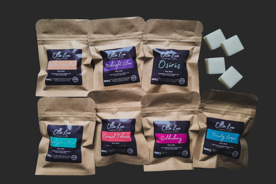 Set of brown paper packages wax melts with labels on a dark background